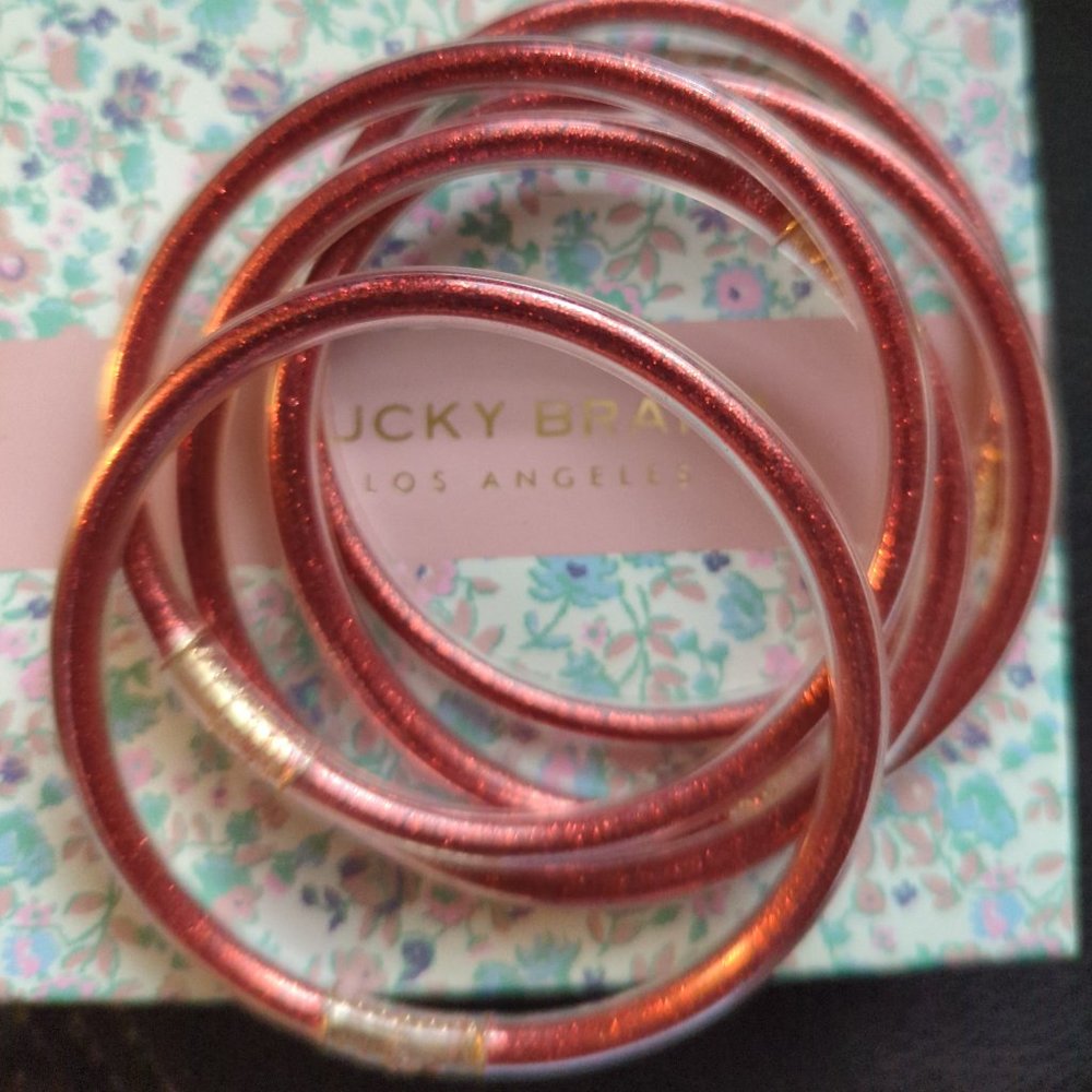 Red glittery bracelets from PR